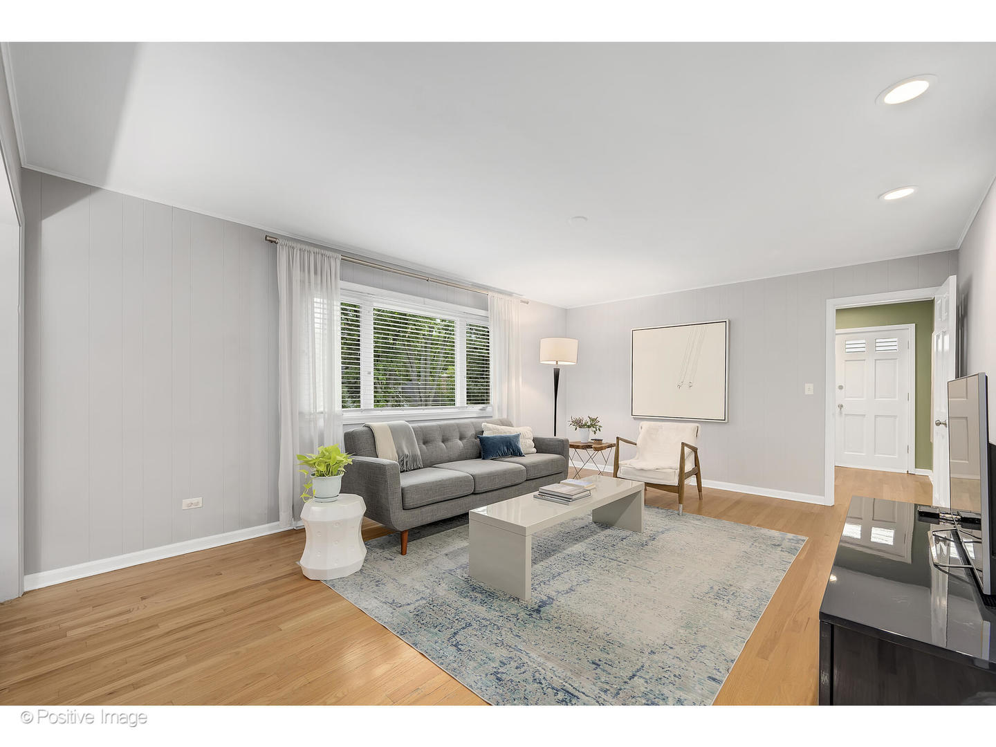 3672 Venard Road Downers Grove, IL 60515 - Photo 16 of 44 a living room with furniture and a window