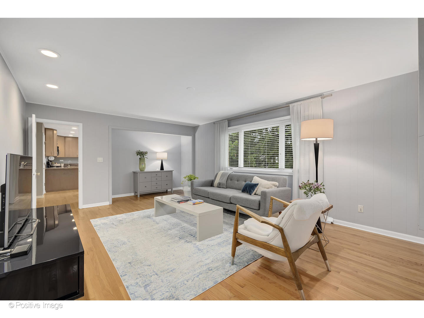 3672 Venard Road Downers Grove, IL 60515 - Photo 17 of 44 a living room with furniture and a window