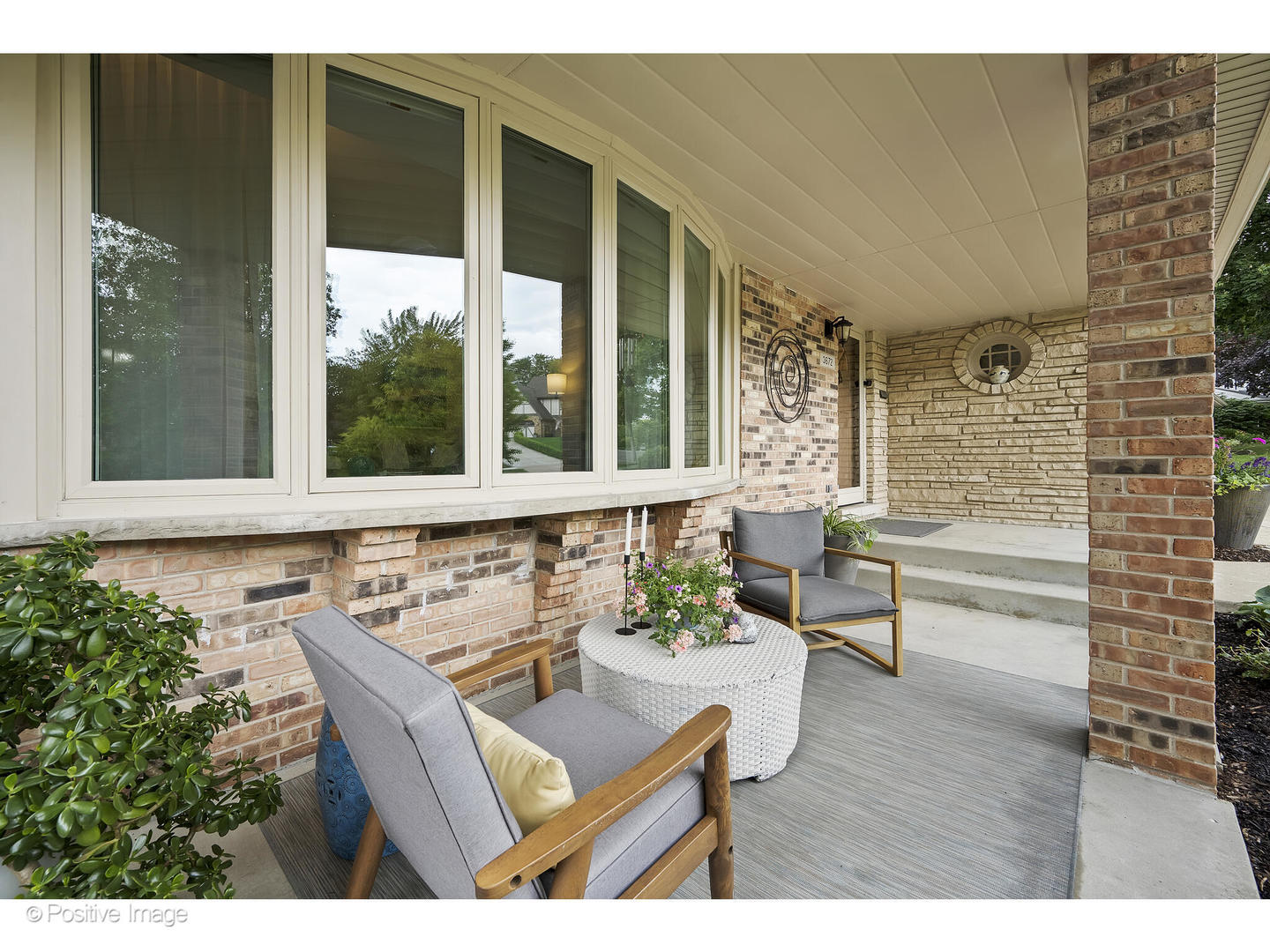 3672 Venard Road Downers Grove, IL 60515 - Photo 2 of 44 a view of a patio with table and chairs and potted plants