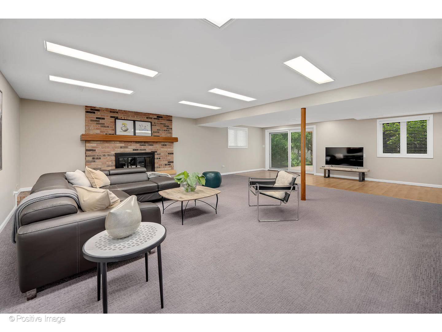 3672 Venard Road Downers Grove, IL 60515 - Photo 28 of 44 a living room with furniture and a flat screen tv