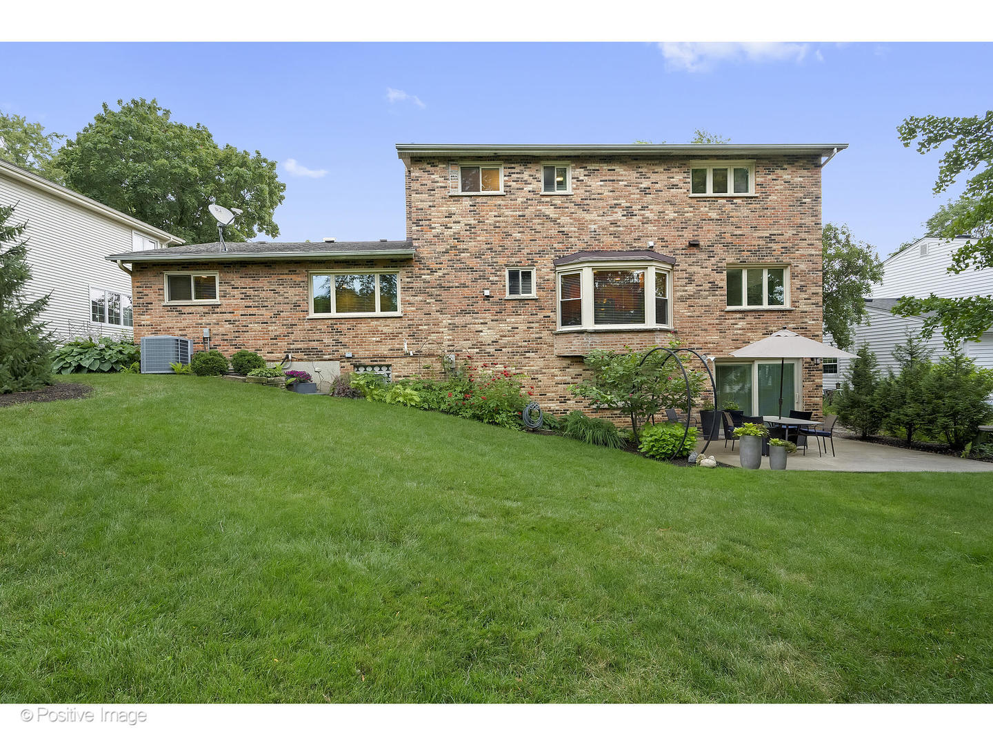 3672 Venard Road Downers Grove, IL 60515 - Photo 35 of 44 a front view of a house with a yard