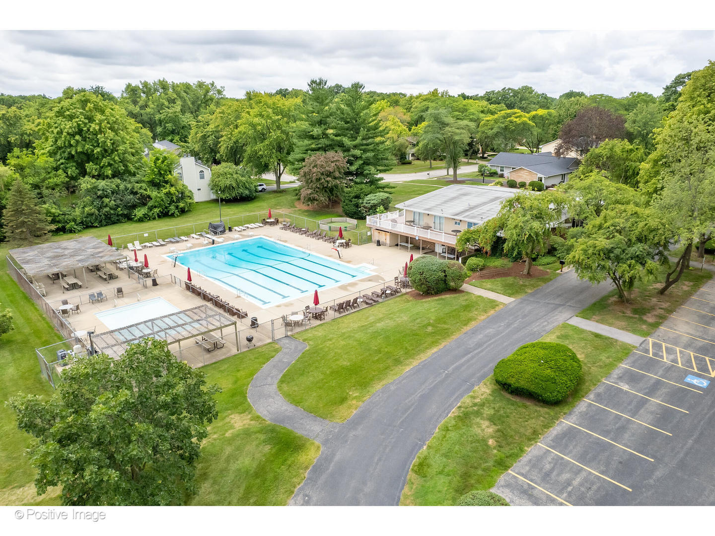 3672 Venard Road Downers Grove, IL 60515 - Photo 43 of 44 a view of a backyard with plants and lake view