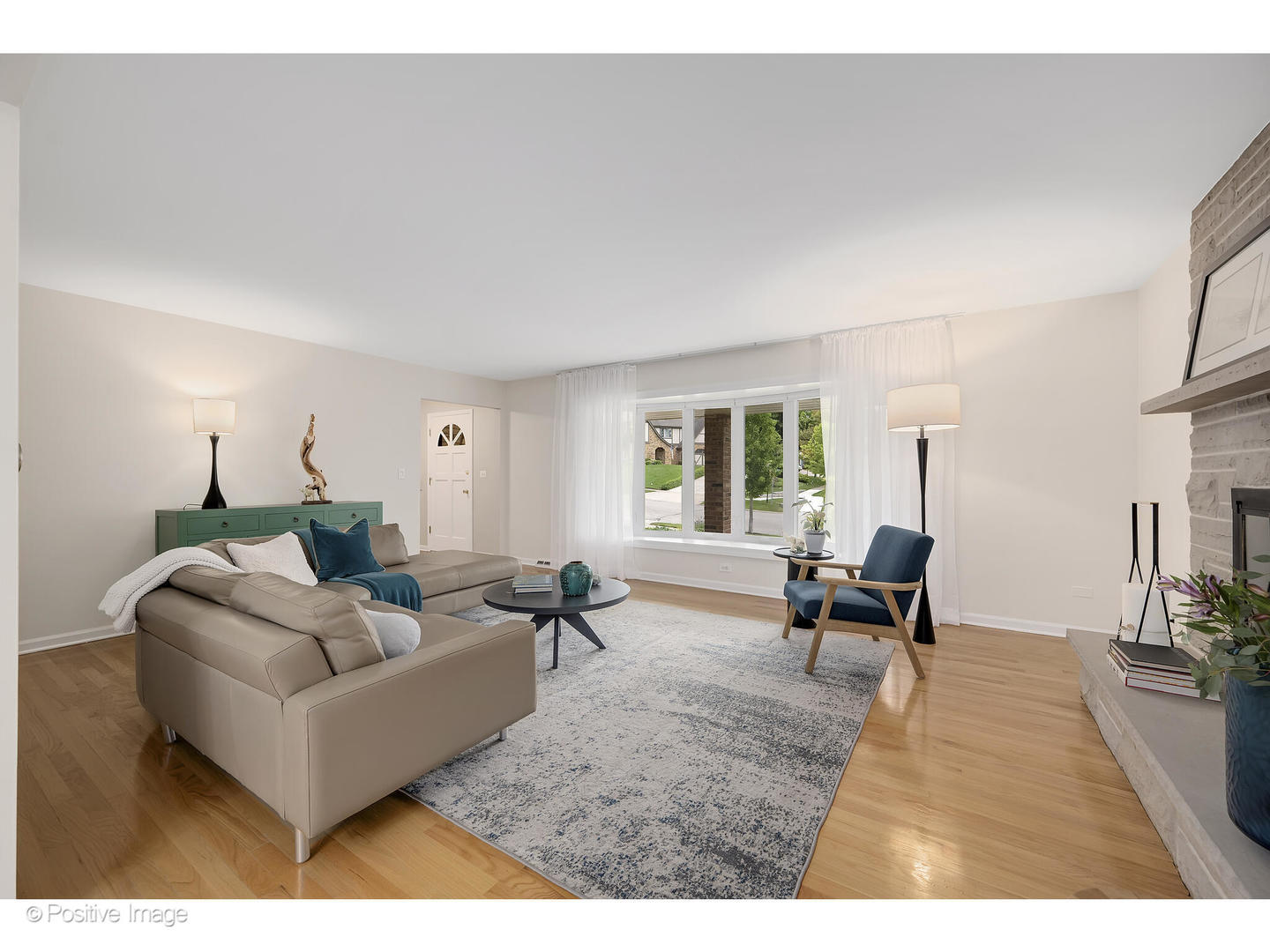 3672 Venard Road Downers Grove, IL 60515 - Photo 6 of 44 a living room with furniture and a couch