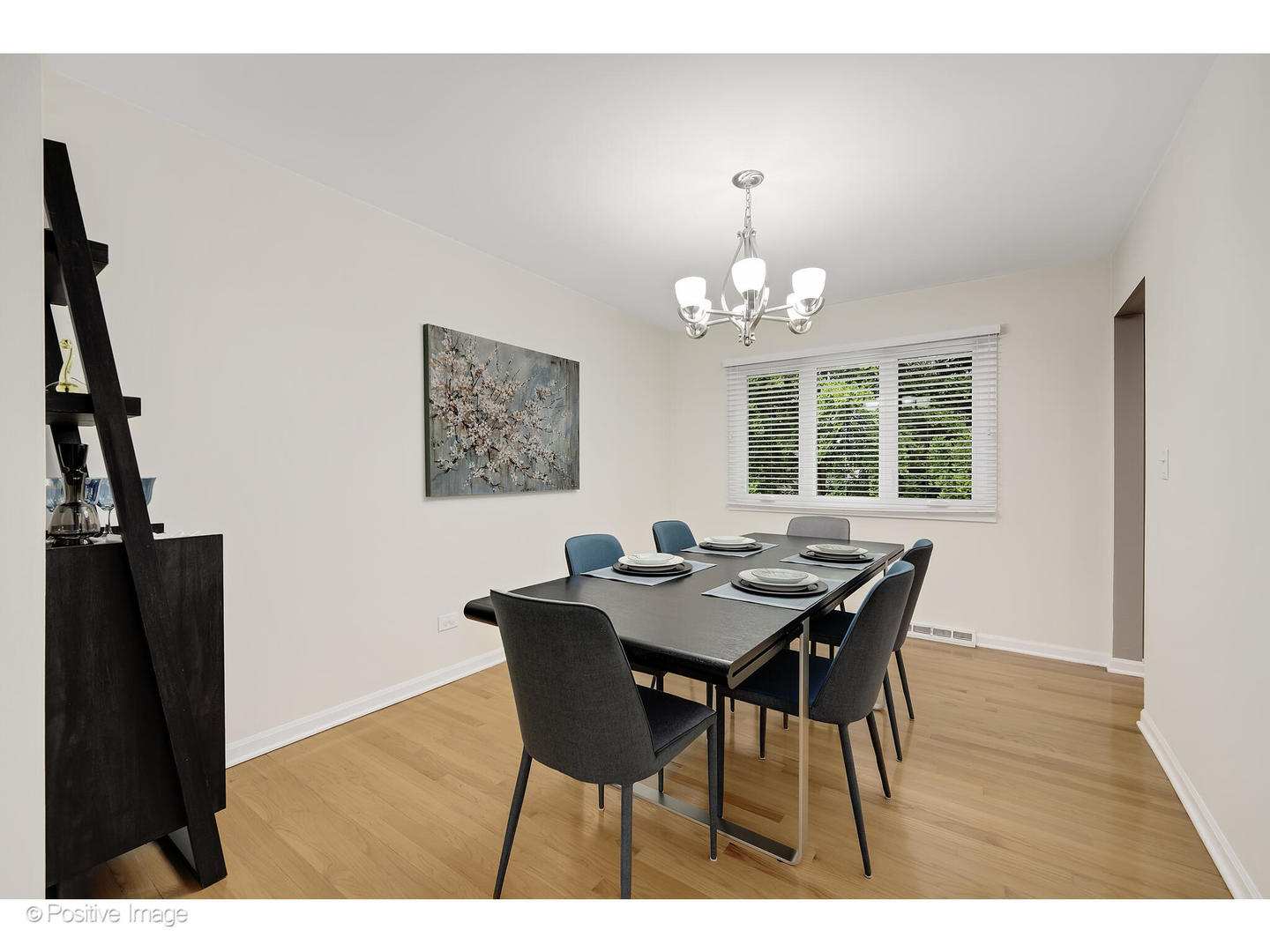 3672 Venard Road Downers Grove, IL 60515 - Photo 9 of 44 a view of a dining room with furniture and wooden floor