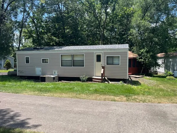 a view of a back yard of the house