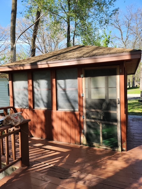 2795 East 28th Road Marseilles, IL 61341 - Photo 24 of 68 a backyard of a house with barbeque oven table and chairs