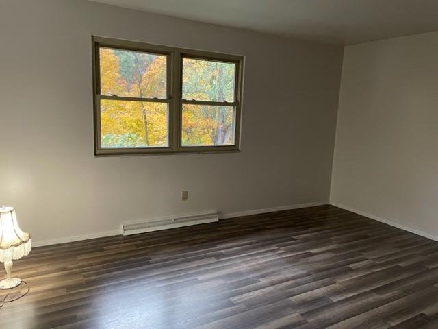 113 Louis Drive McKees Rocks, PA 15136 - Photo 12 of 25 a view of an empty room with wooden floor and a window