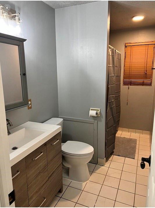 113 Louis Drive McKees Rocks, PA 15136 - Photo 17 of 25 a bathroom with a toilet sink and mirror