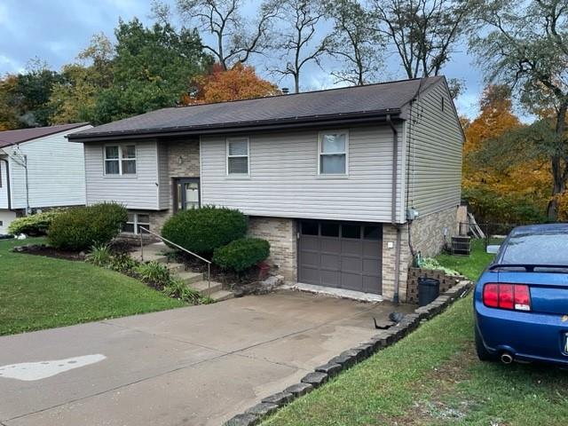 113 Louis Drive McKees Rocks, PA 15136 - Photo 2 of 25 a view of a house with a backyard