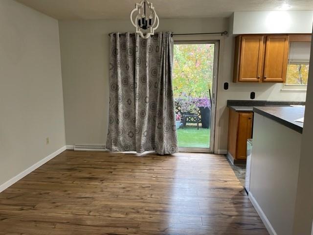 113 Louis Drive McKees Rocks, PA 15136 - Photo 6 of 25 a view of entryway with kitchen and wooden floor