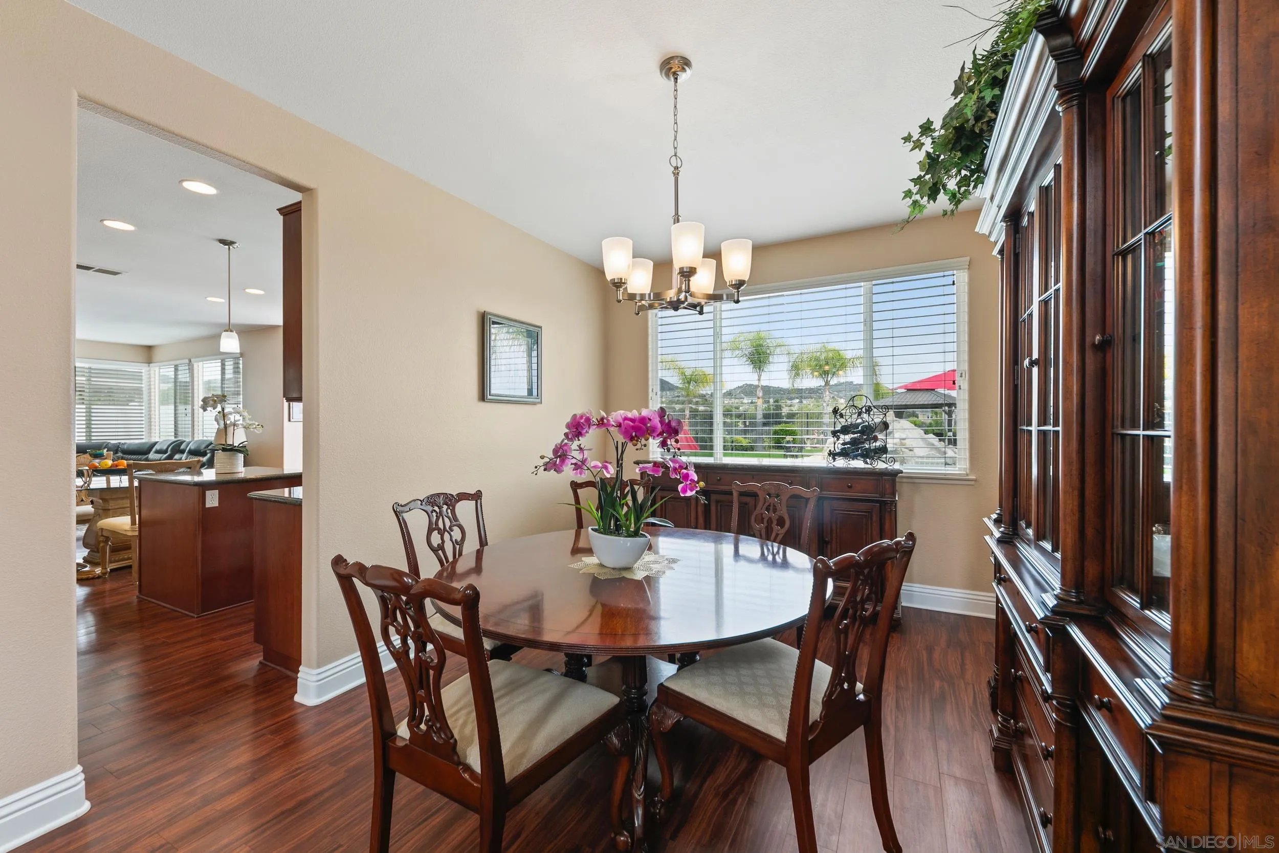 35920 Devonshire Lane Wildomar, CA 92595 - Photo 12 of 50 a view of a dining room with furniture window and wooden floor