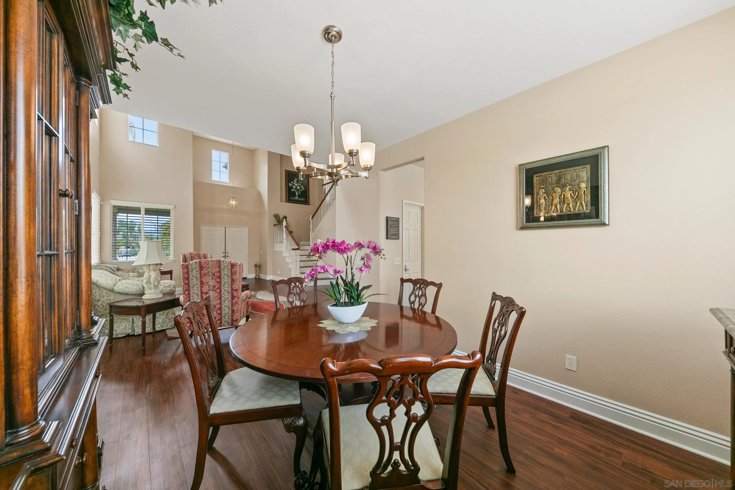 35920 Devonshire Lane Wildomar, CA 92595 - Photo 13 of 50 a view of a dining room with furniture and chandelier