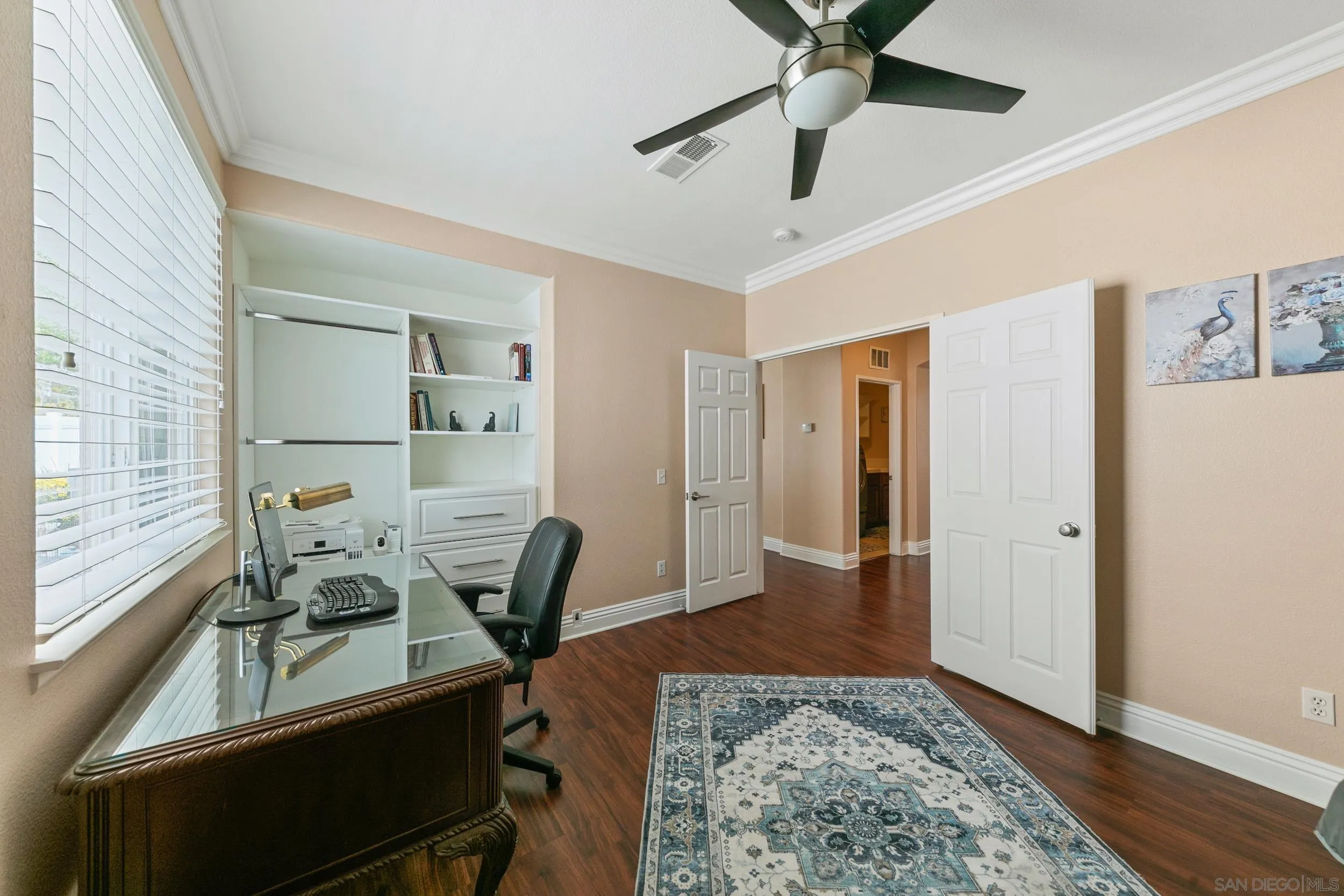 35920 Devonshire Lane Wildomar, CA 92595 - Photo 17 of 50 a view of a workspace with furniture and a window