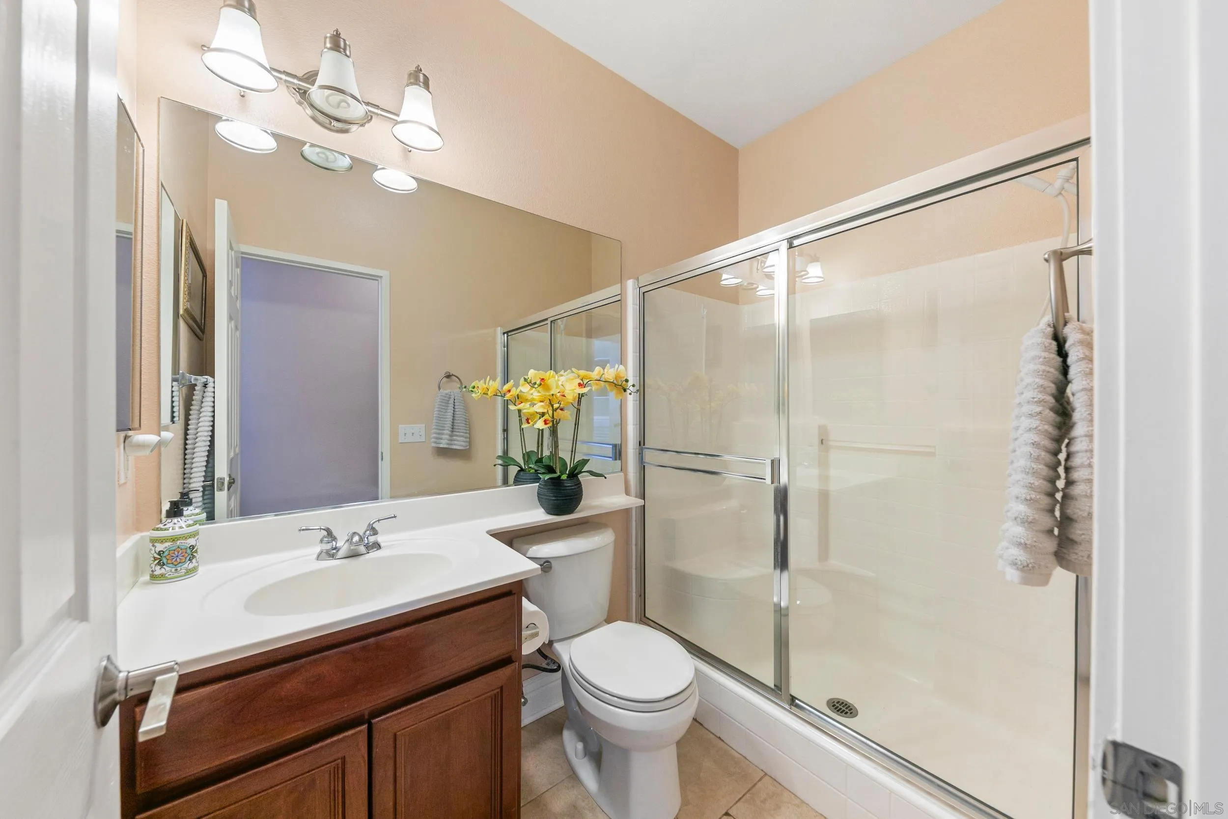 35920 Devonshire Lane Wildomar, CA 92595 - Photo 18 of 50 a bathroom with a sink a toilet and shower