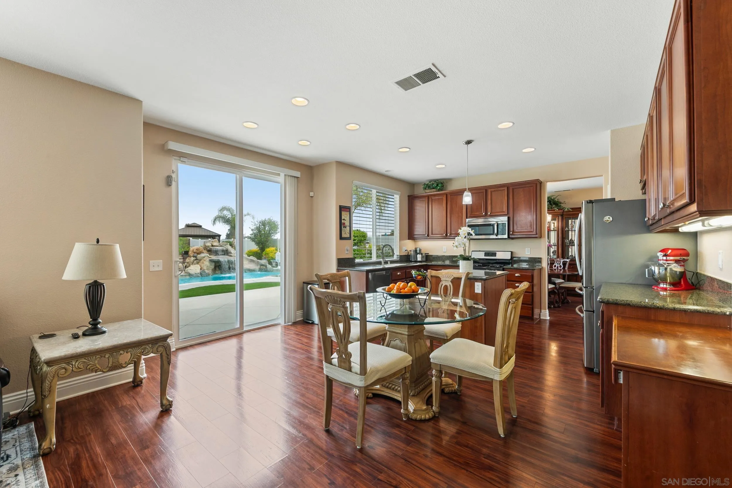 35920 Devonshire Lane Wildomar, CA 92595 - Photo 21 of 50 a view of a dining room with furniture window and wooden floor