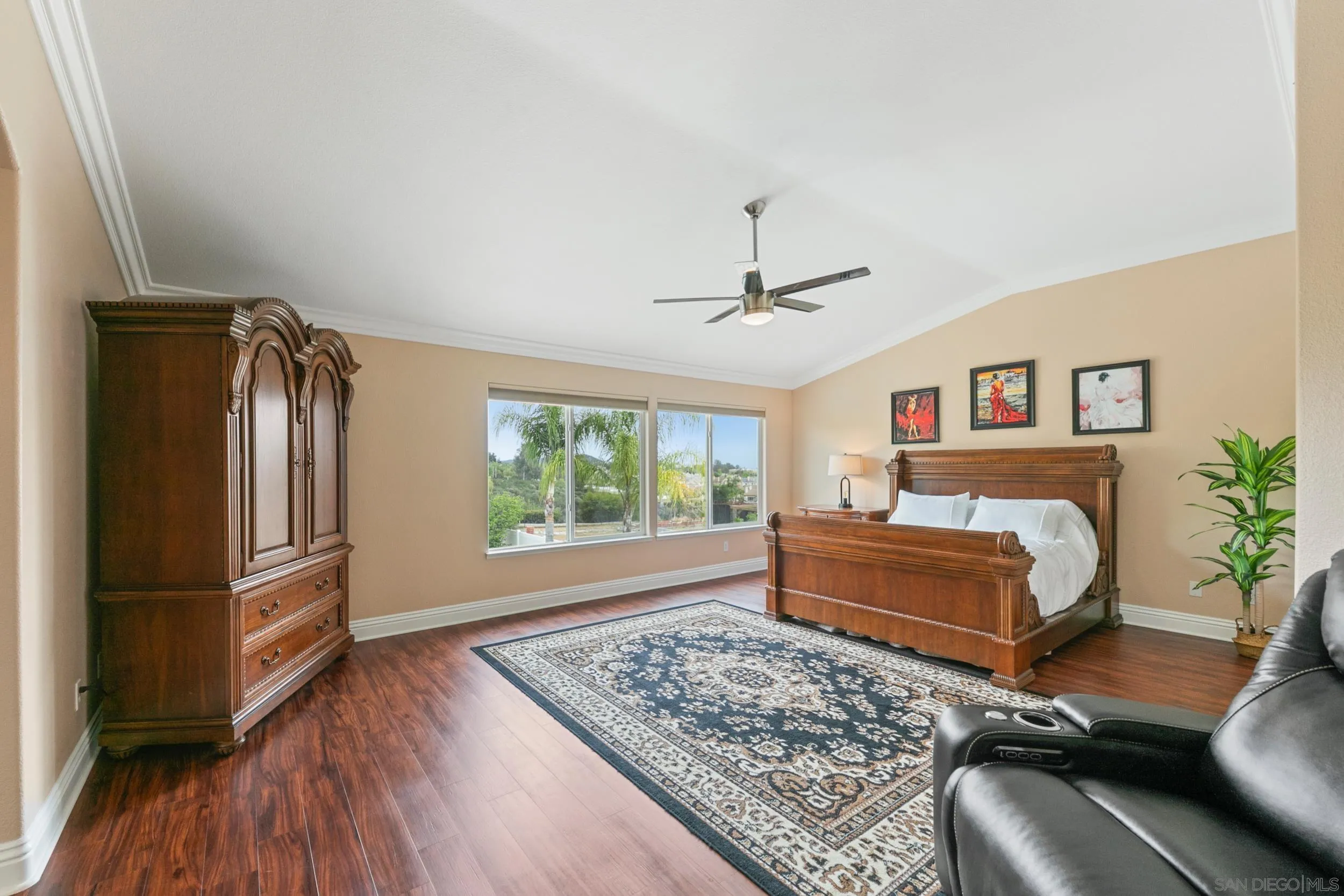 35920 Devonshire Lane Wildomar, CA 92595 - Photo 26 of 50 a bedroom with furniture and a wooden floor