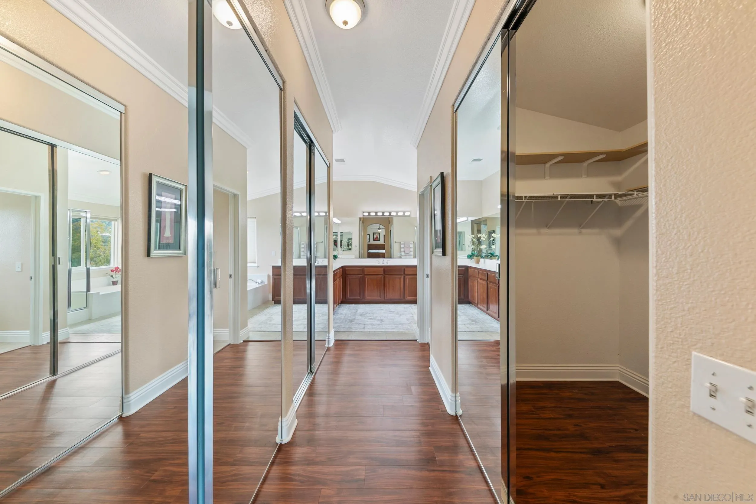 35920 Devonshire Lane Wildomar, CA 92595 - Photo 28 of 50 a view of a hallway with wooden floor and furniture