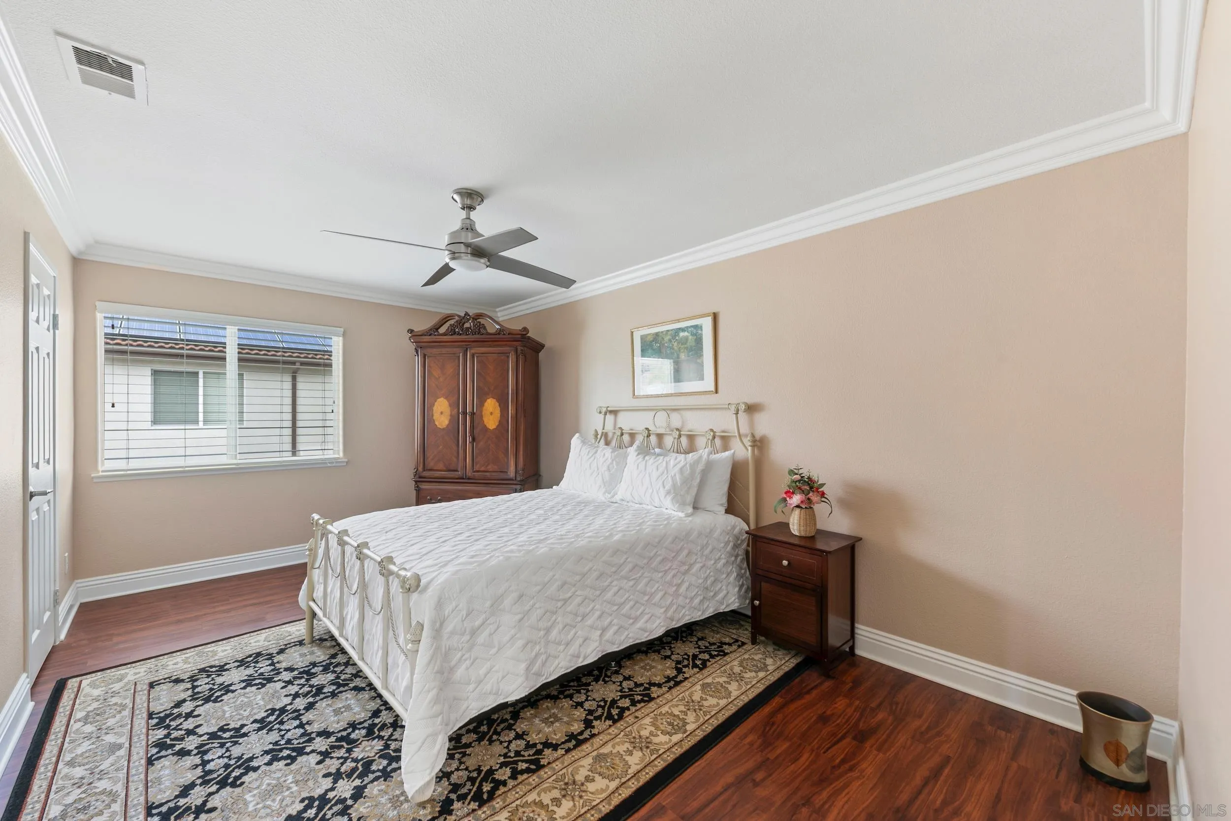 35920 Devonshire Lane Wildomar, CA 92595 - Photo 34 of 50 a room with a bed and a window