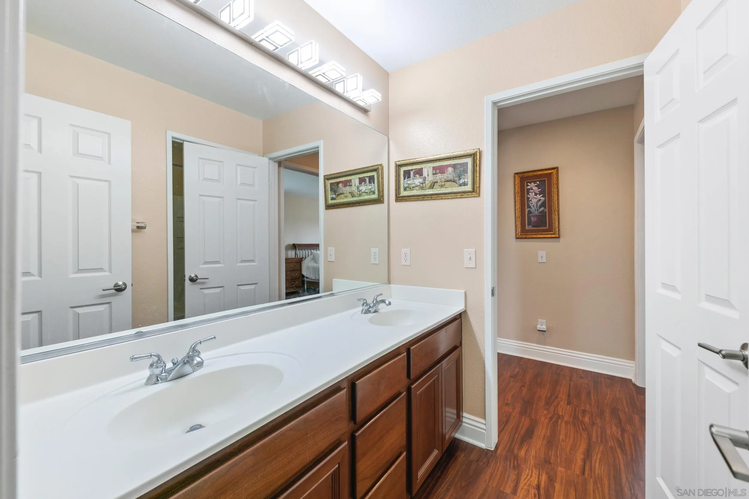 35920 Devonshire Lane Wildomar, CA 92595 - Photo 36 of 50 a bathroom with a sink and a mirror