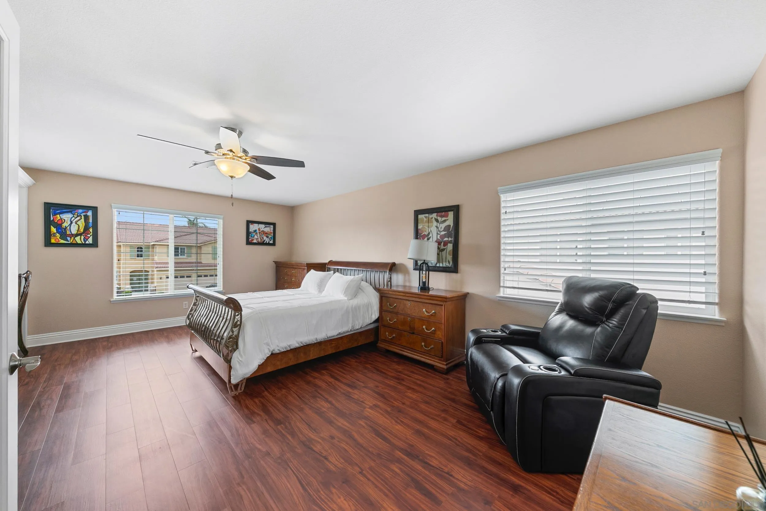 35920 Devonshire Lane Wildomar, CA 92595 - Photo 38 of 50 a bedroom with a bed and wooden floor