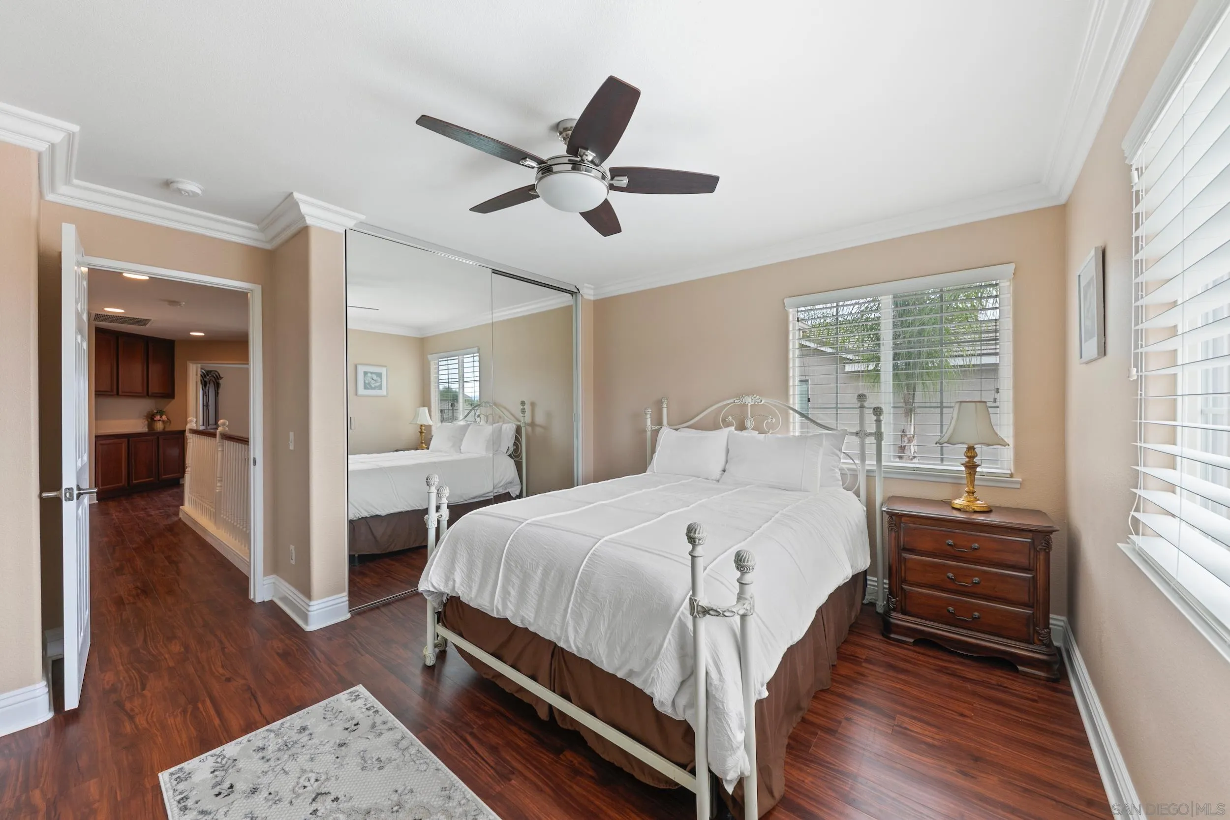 35920 Devonshire Lane Wildomar, CA 92595 - Photo 41 of 50 a bedroom with a bed and wooden floor