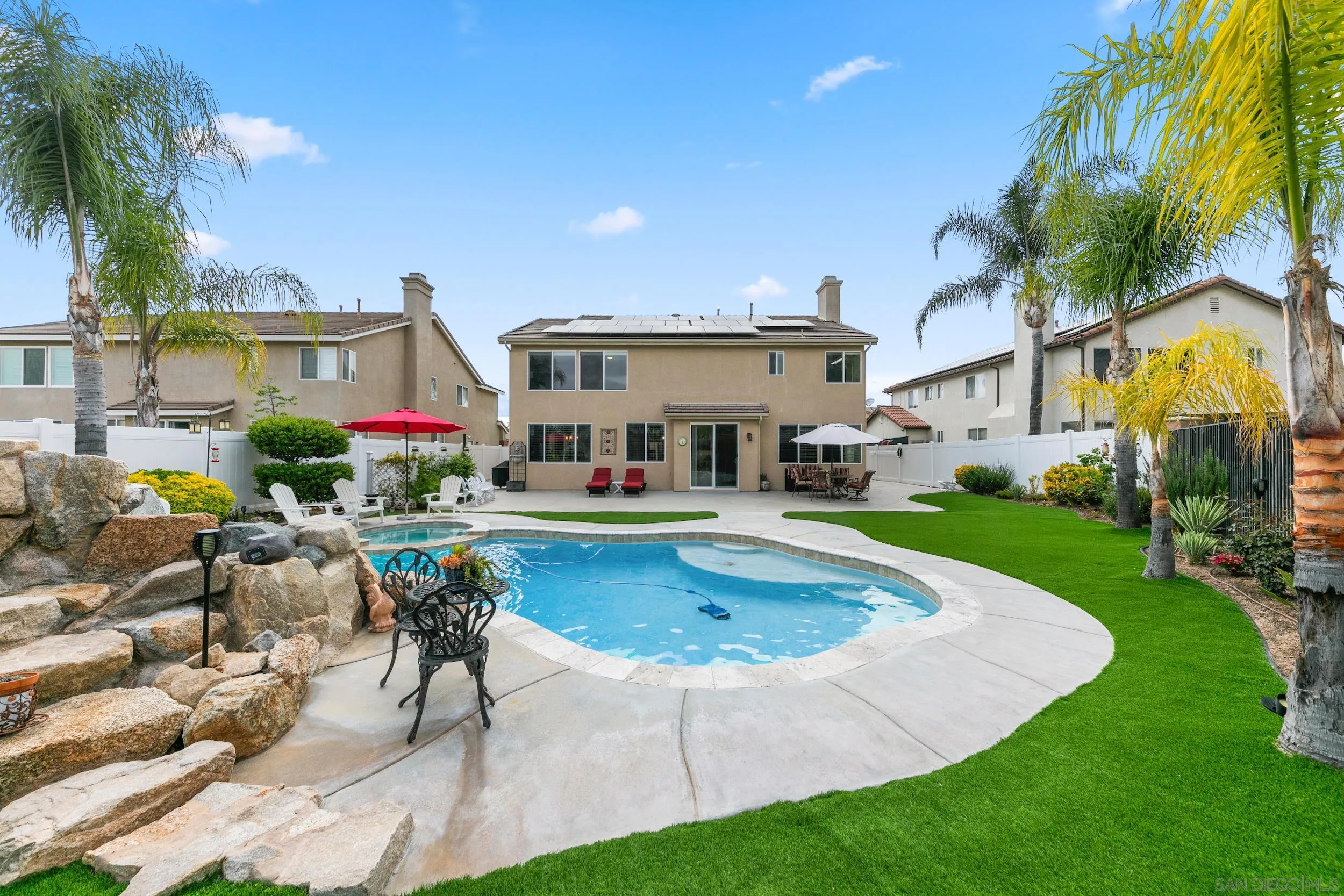35920 Devonshire Lane Wildomar, CA 92595 - Photo 47 of 50 a view of a house with swimming pool and sitting area