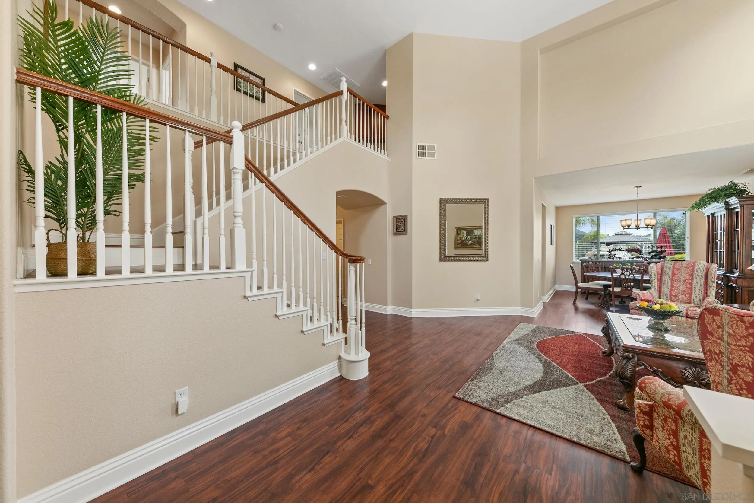 35920 Devonshire Lane Wildomar, CA 92595 - Photo 8 of 50 a view of a livingroom with furniture staircase and windows