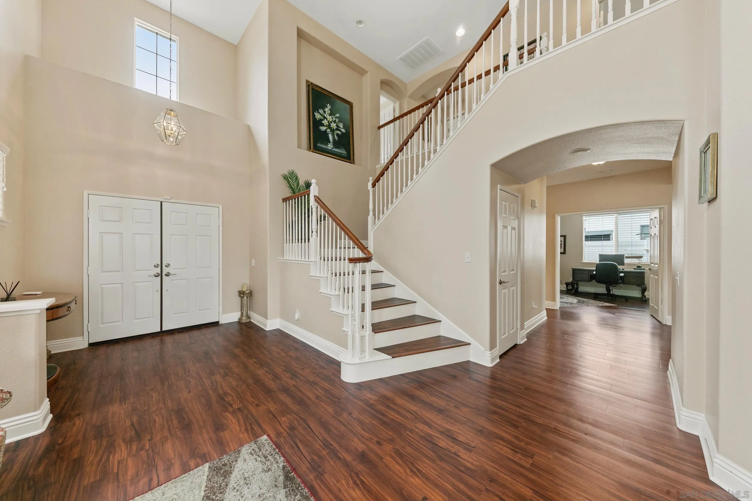 35920 Devonshire Lane Wildomar, CA 92595 - Photo 10 of 50 a view of a hallway with wooden floor and staircase