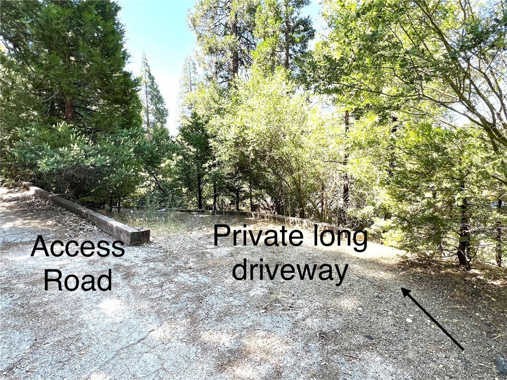 329 Grass Valley Road Lake Arrowhead, CA 92352 - Photo 27 of 31 a view of outdoor space with sign board
