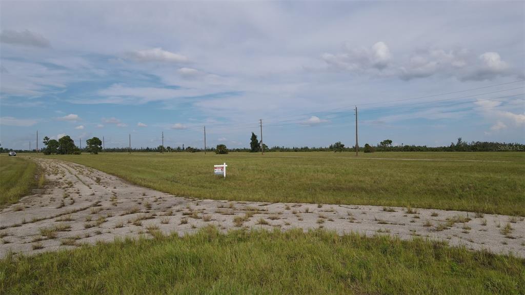 6 Hummingbird Drive Placida, FL 33946 - Photo 6 of 14 a view of a field with an ocean