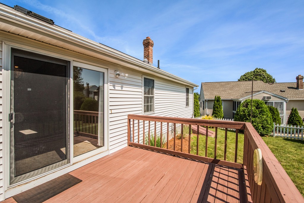 6 Chandler Way, Unit 6 Northborough, MA 01532 - Photo 29 of 37 a view of a balcony with furniture