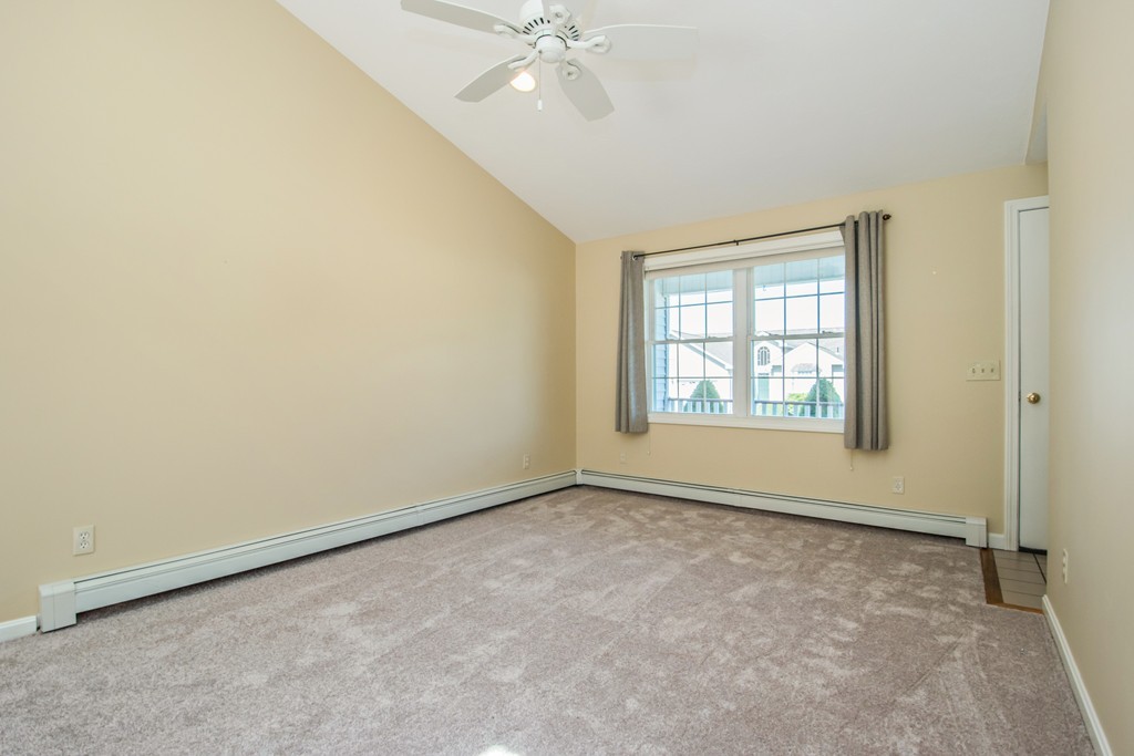 6 Chandler Way, Unit 6 Northborough, MA 01532 - Photo 6 of 37 an empty room with a window