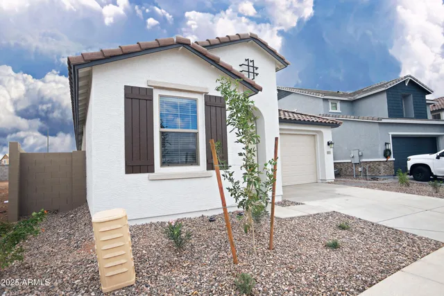 a view of a house with a patio