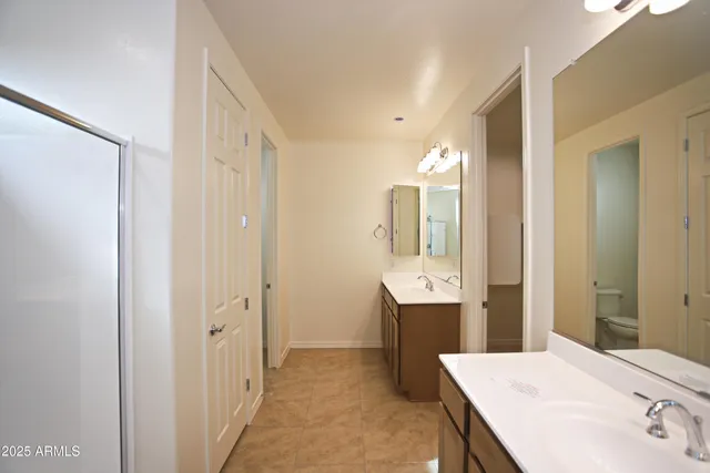 a view of a room with shelf on the wall