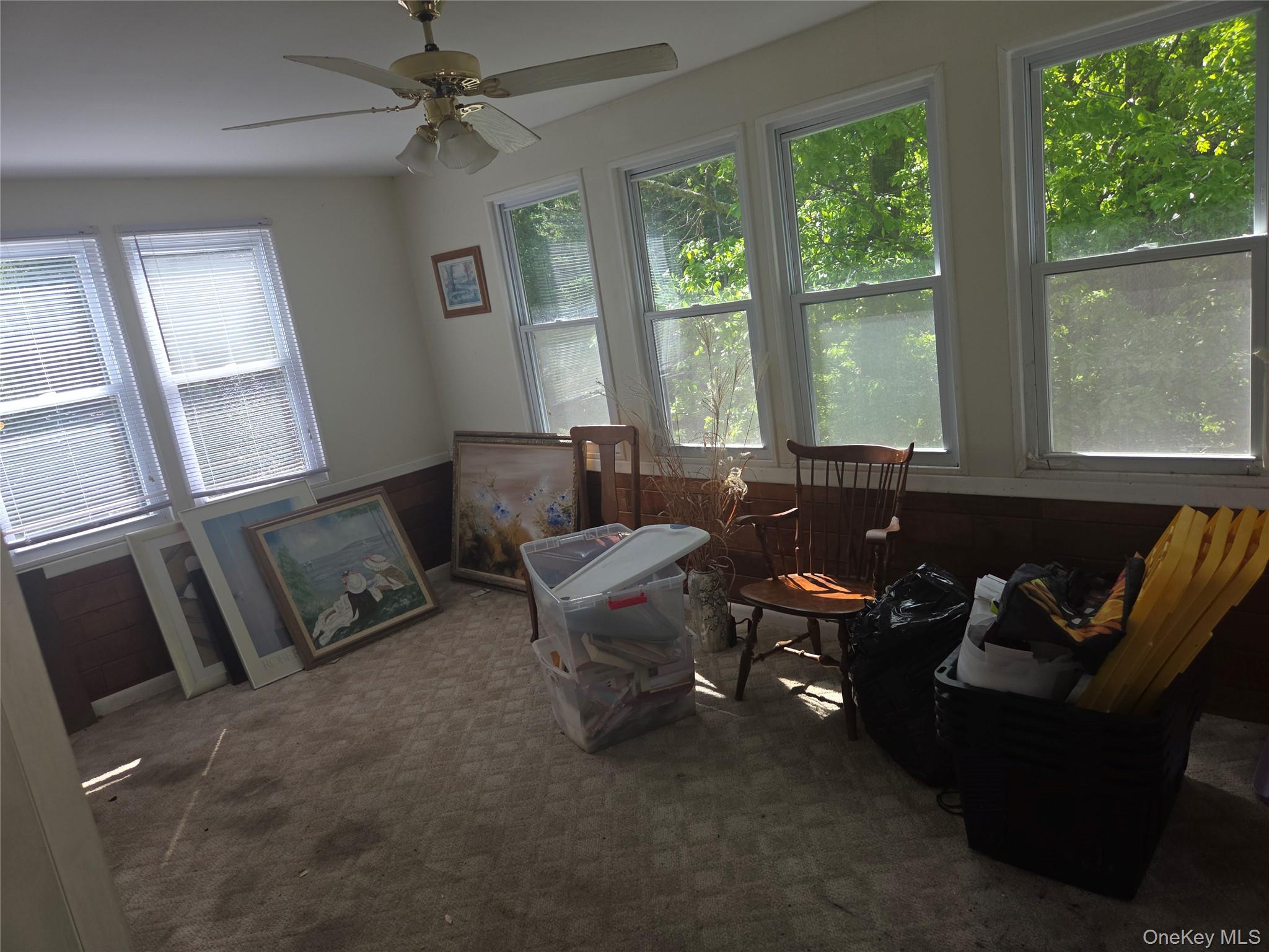 63 Otens Road Ellenville, NY 12428 - Photo 22 of 32 a living room with furniture and a flat screen tv