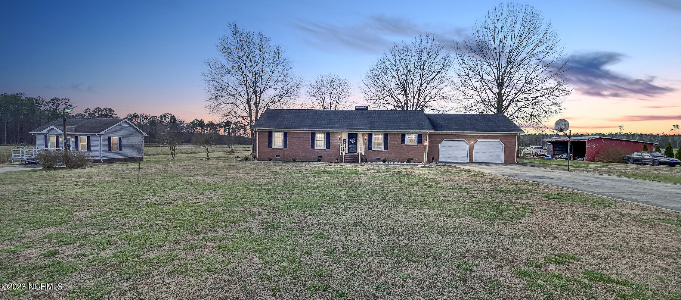 139 Johnny Harrell Road Gates, NC 27937 - Photo 1 of 56 1.8 acres of peaceful country living just minutes from Virginia line.
