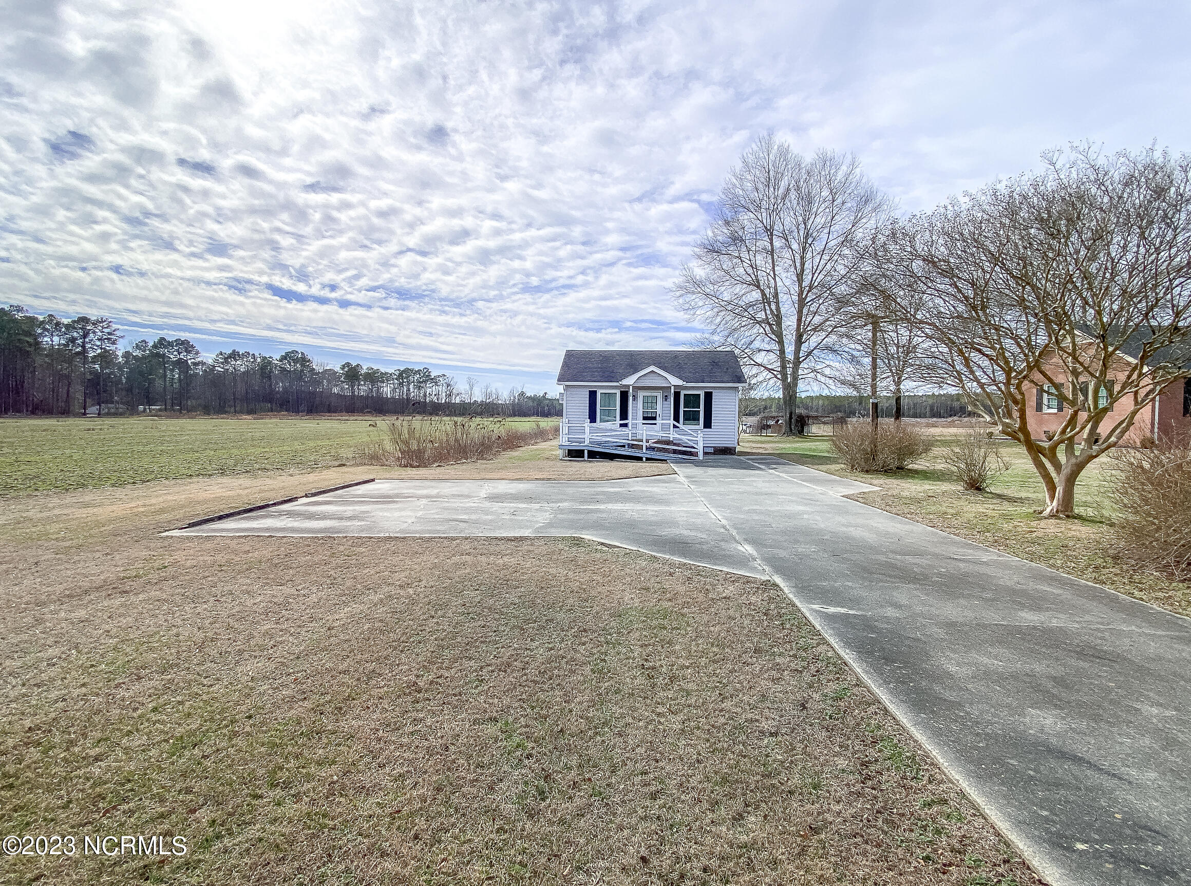 139 Johnny Harrell Road Gates, NC 27937 - Photo 31 of 56 Guest house has convenient private driveway with parking and wheelchair ramp.