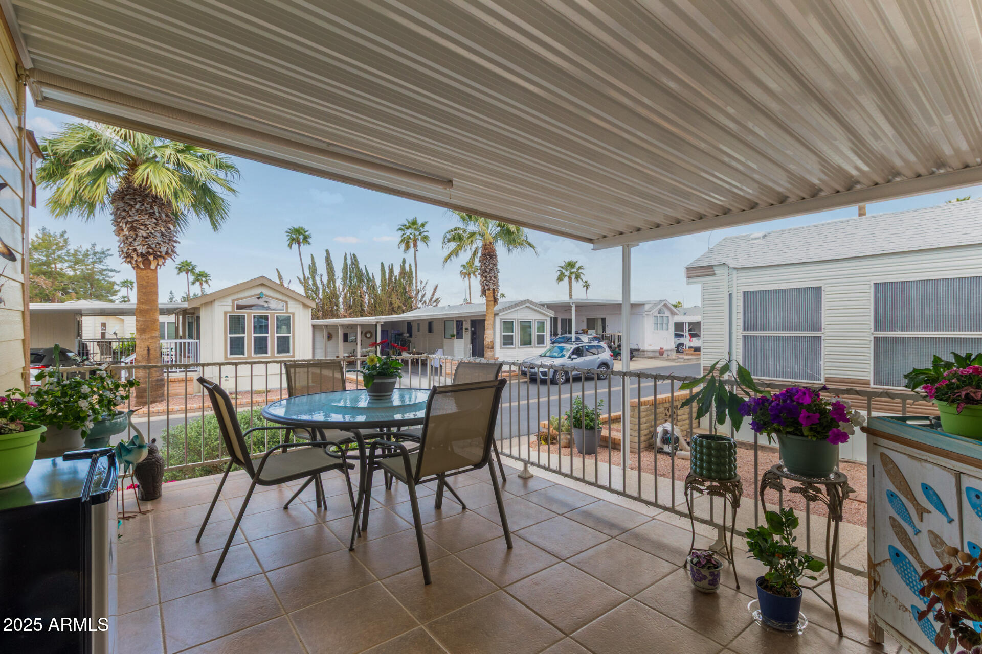111 South Greenfield Road, Unit 449 Mesa, AZ 85206 - Photo 21 of 34 a view of a dining room with furniture window and outside view