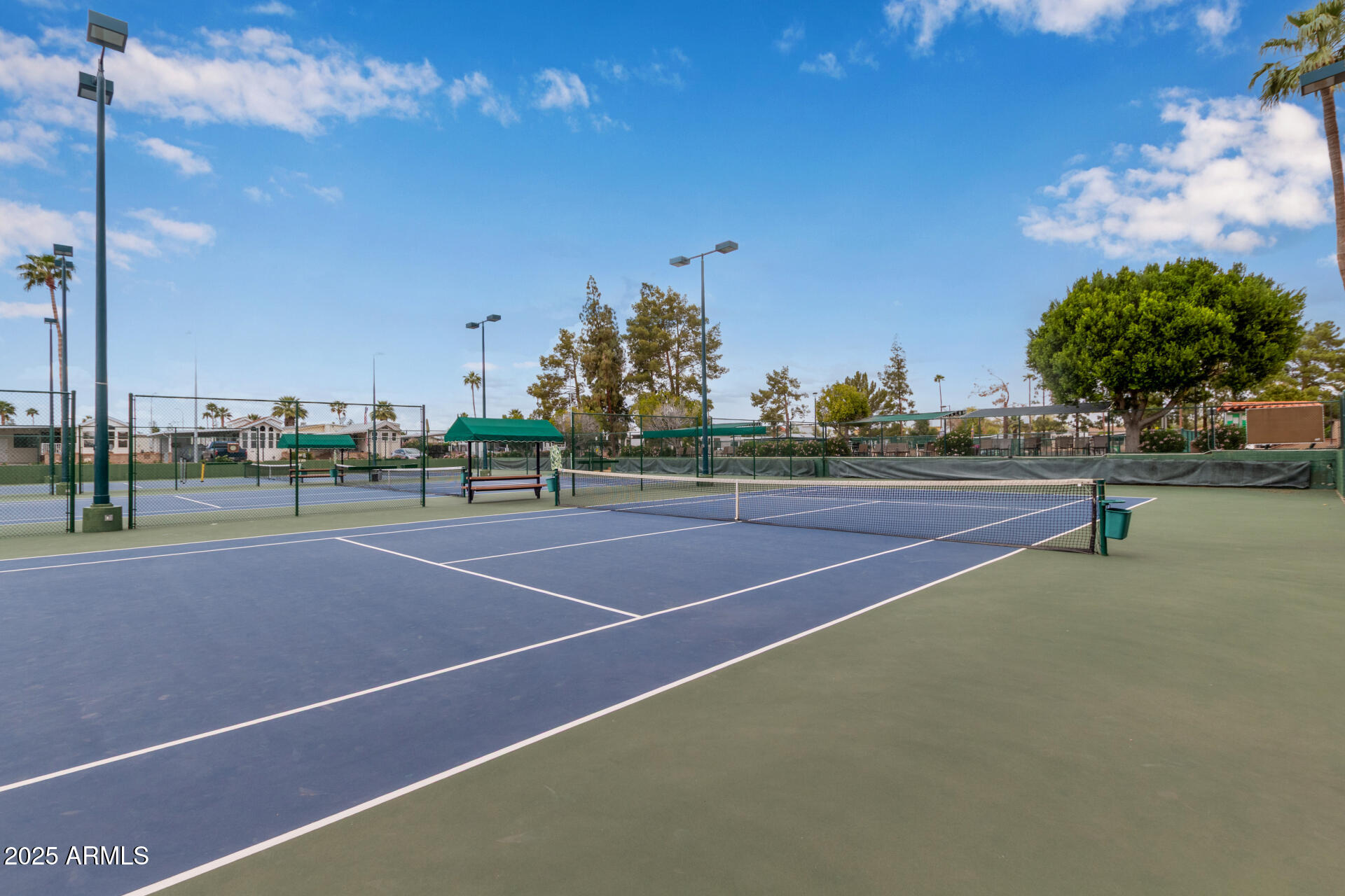 111 South Greenfield Road, Unit 449 Mesa, AZ 85206 - Photo 25 of 34 a view of a tennis court