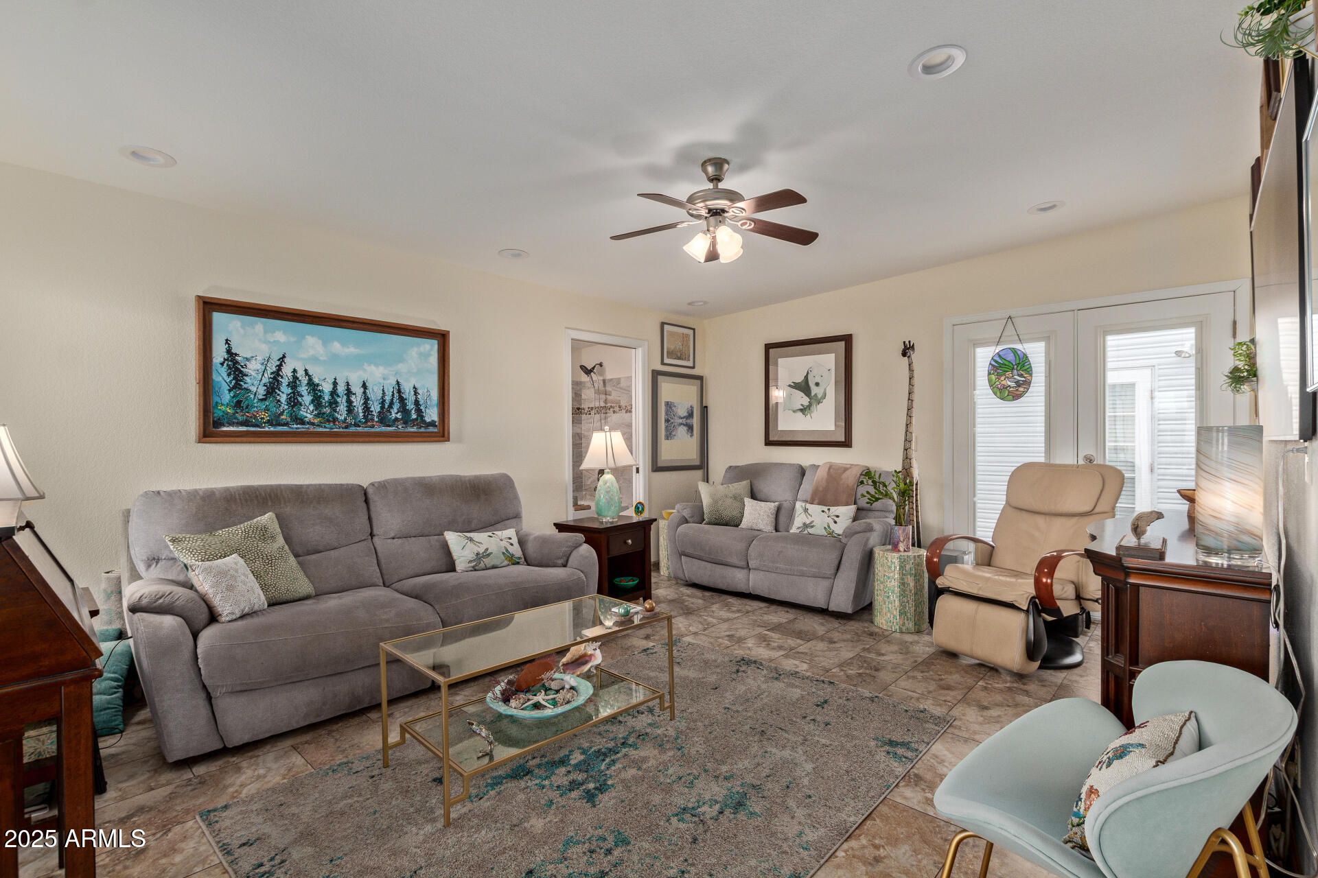 111 South Greenfield Road, Unit 449 Mesa, AZ 85206 - Photo 7 of 34 a living room with furniture