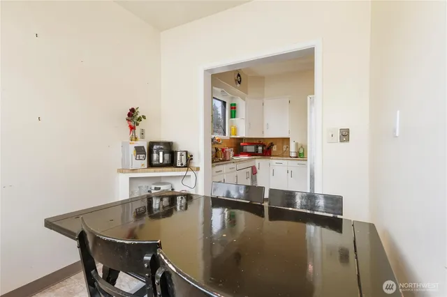 a view of a living room and dining room