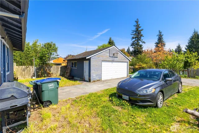 a swimming pool with some trees in the background
