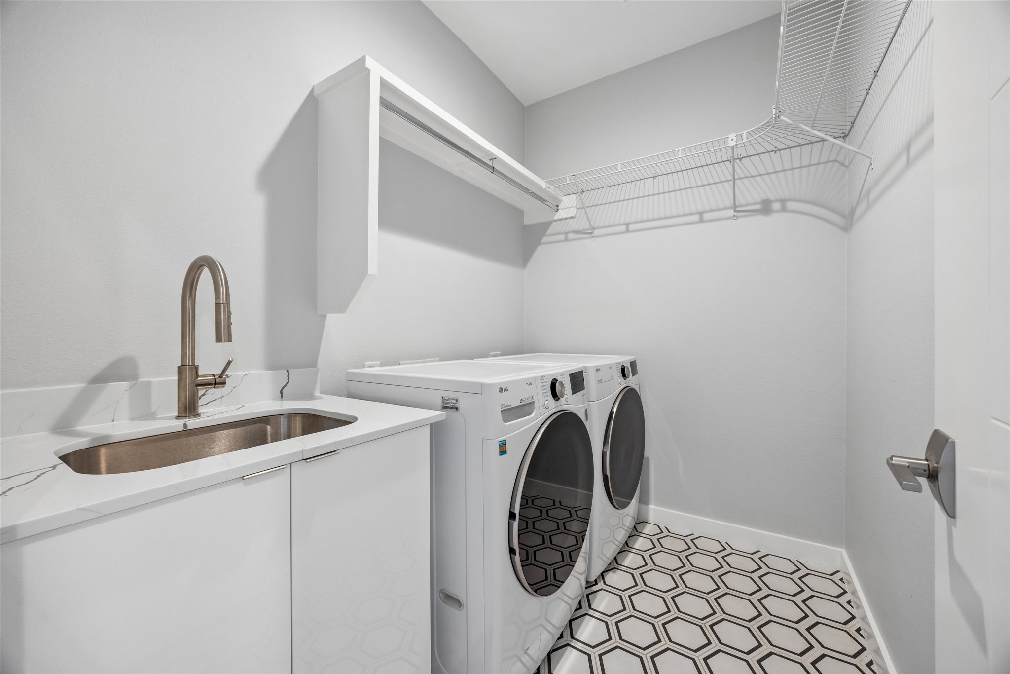 2108 Tillery Street, Unit 9 Austin, TX 78723 - Photo 20 of 25 Dedicated laundry room with utility sink