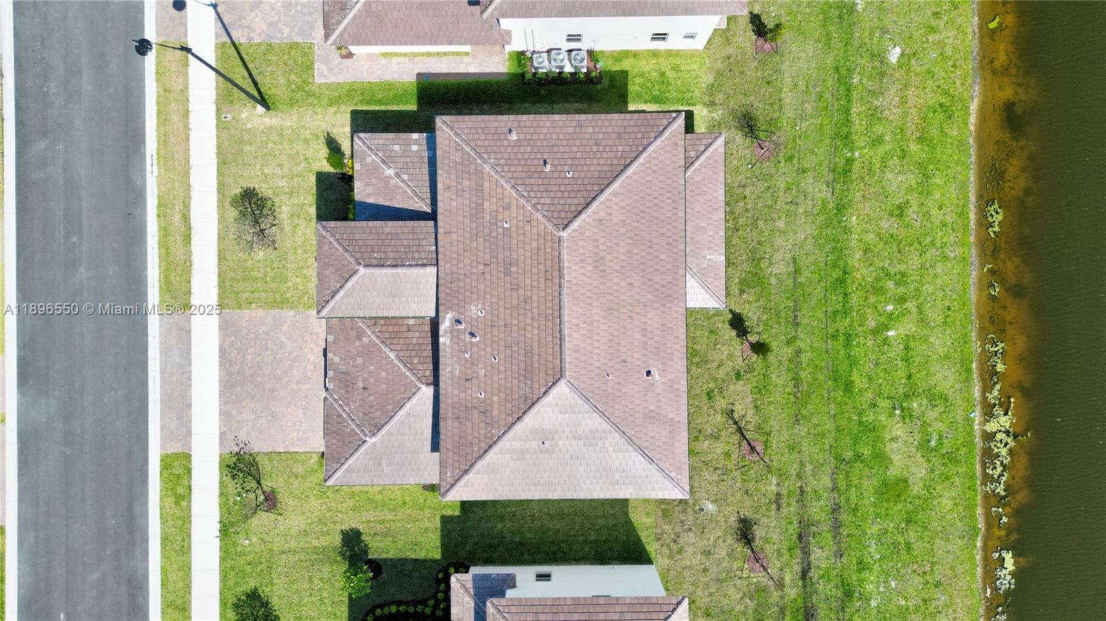 4390 Southwest 122nd Terrace Davie, FL 33330 - Photo 14 of 65 a aerial view of a house with a yard