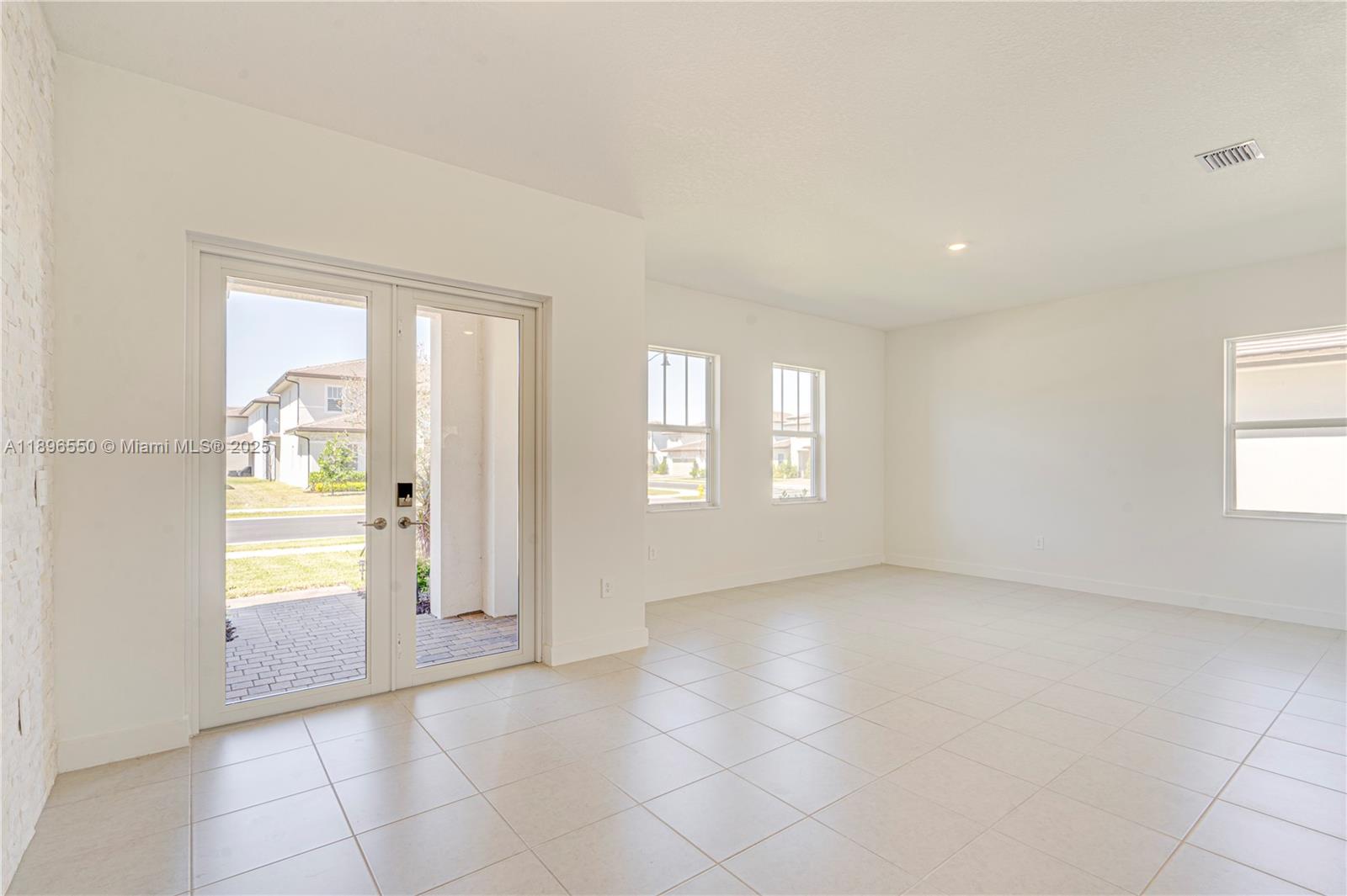 4390 Southwest 122nd Terrace Davie, FL 33330 - Photo 28 of 65 a view of an empty room with window