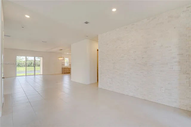a bathroom with a sink a vanity and a mirror
