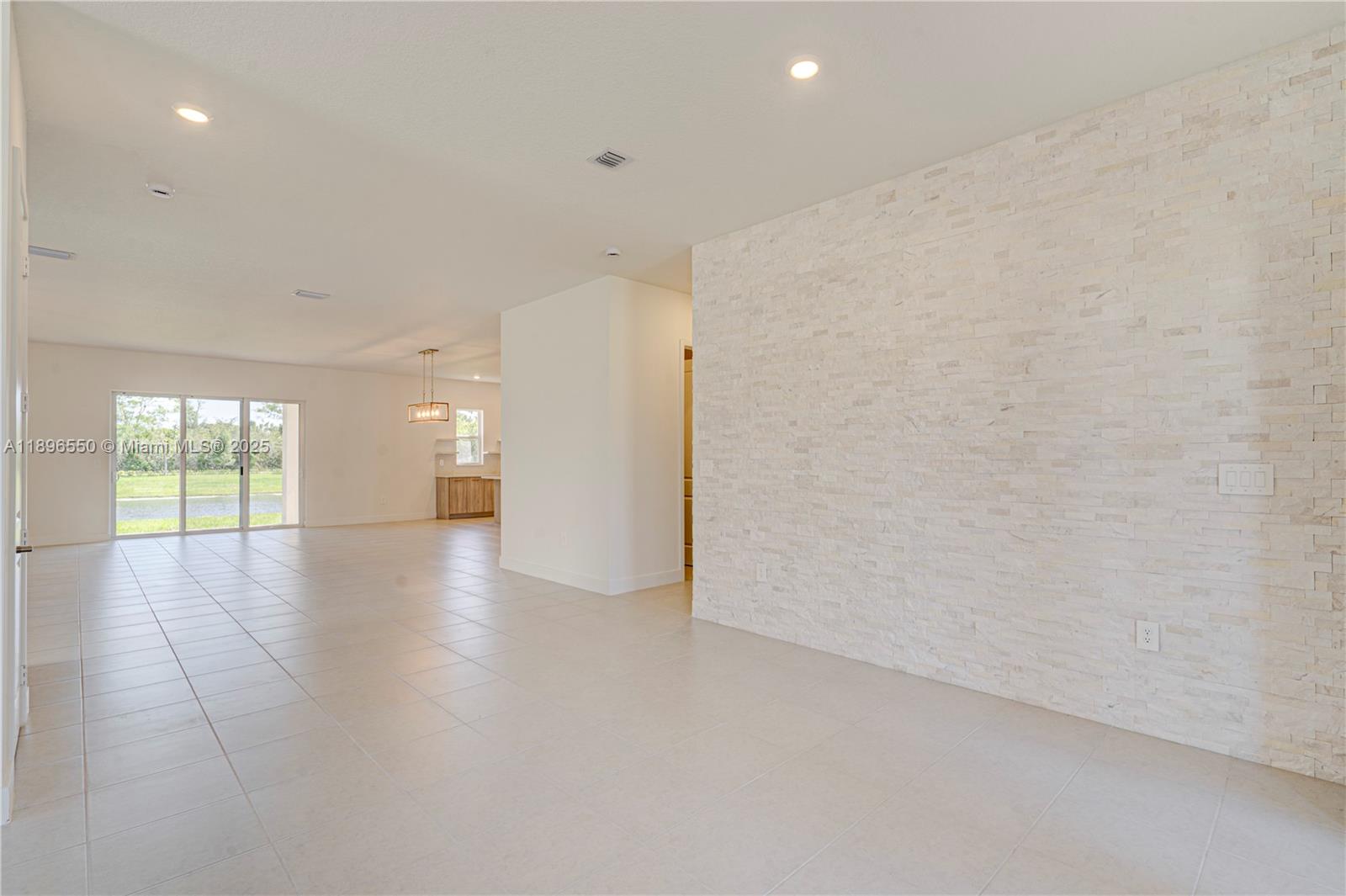 4390 Southwest 122nd Terrace Davie, FL 33330 - Photo 30 of 65 wooden floor in an empty room with a window