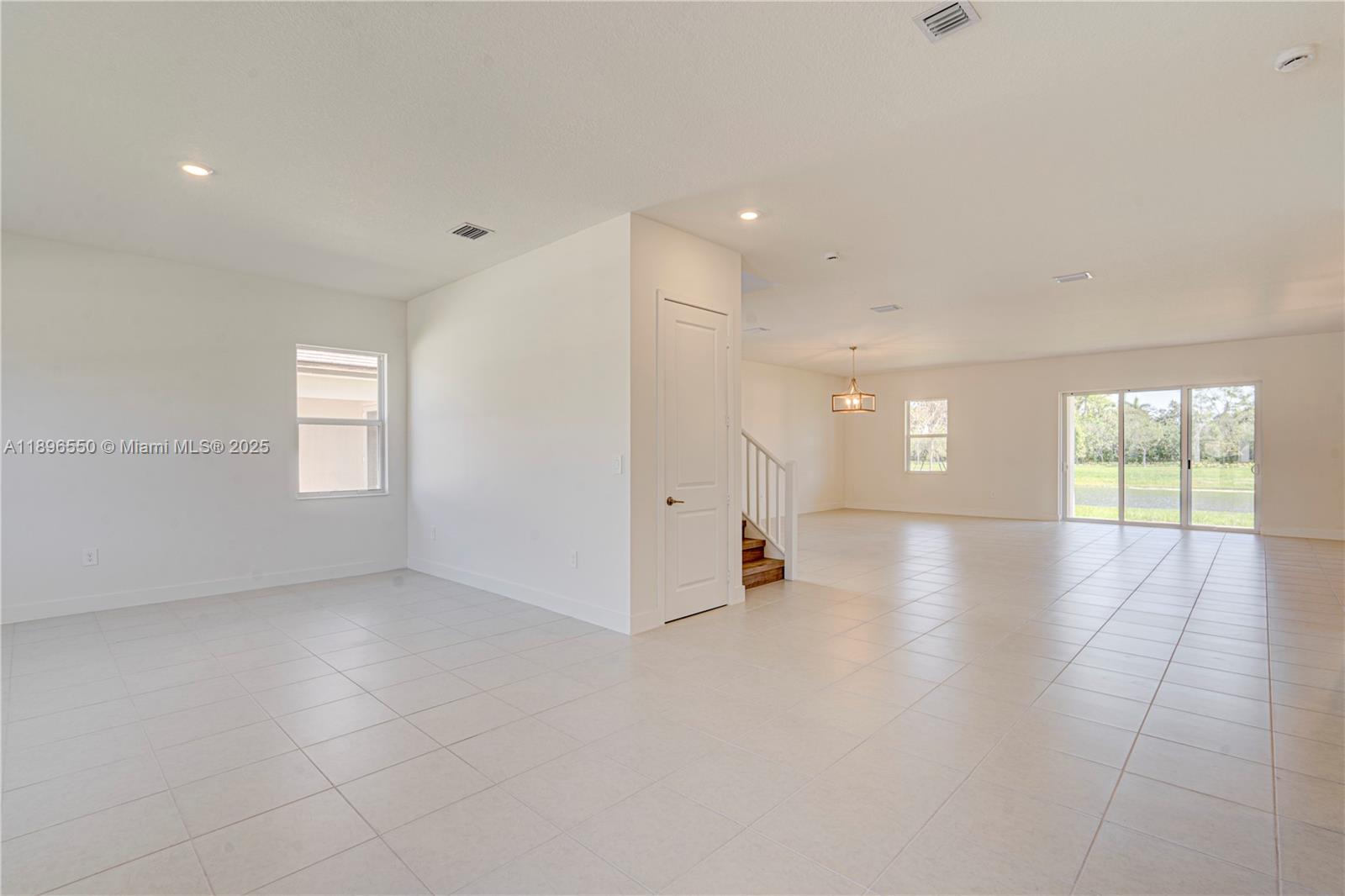 4390 Southwest 122nd Terrace Davie, FL 33330 - Photo 31 of 65 a view of a livingroom with a staircase