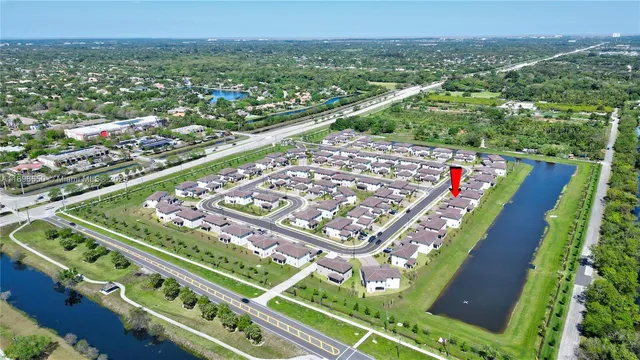 a aerial view of a house with a yard