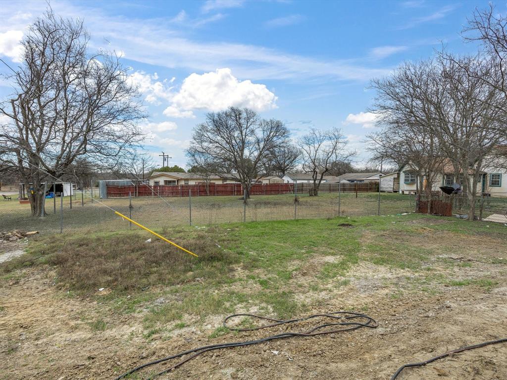 108 Couch Street Italy, TX 76651 - Photo 20 of 23 a view of a park with large trees